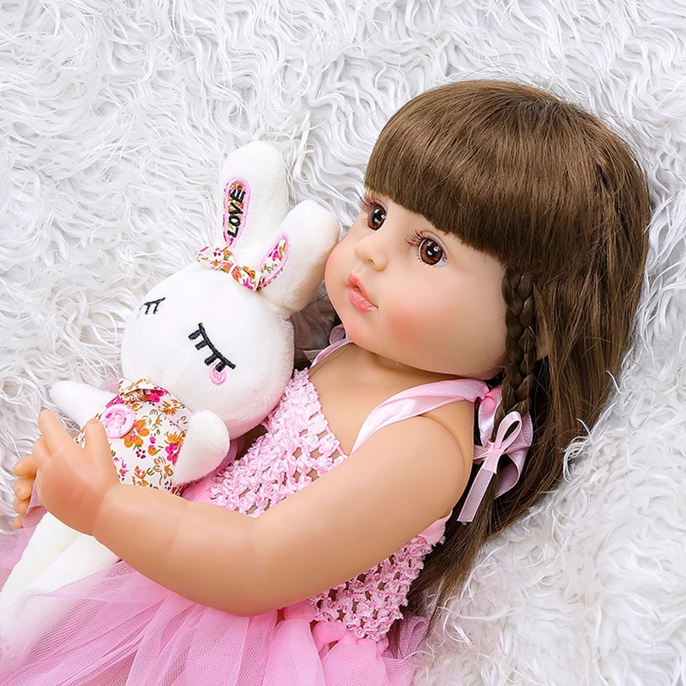 Boneca Bebê Reborn Menina 100% Silicone Pode Tomar Banho Coelho Rosa
